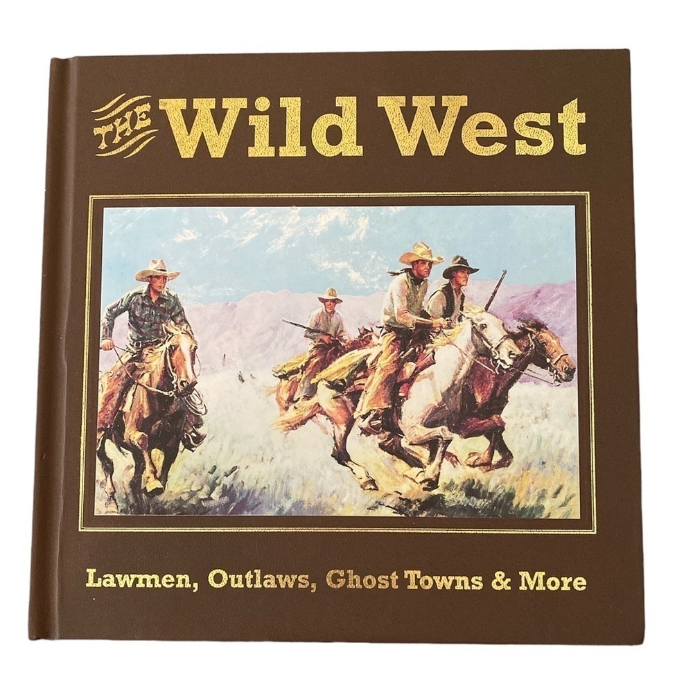 The Wild West book Lawman Outlaws Ghost Towns and more 2002.    #OS